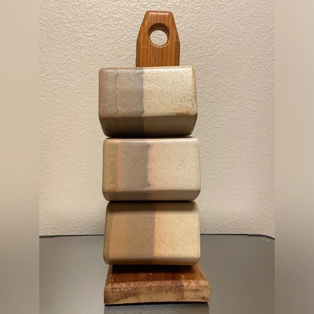Rodolfo Padilla stacking mugs